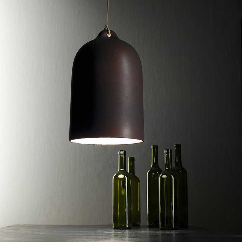 Luminaire cloche teinte rouille Luminaire cloche teinte rouille